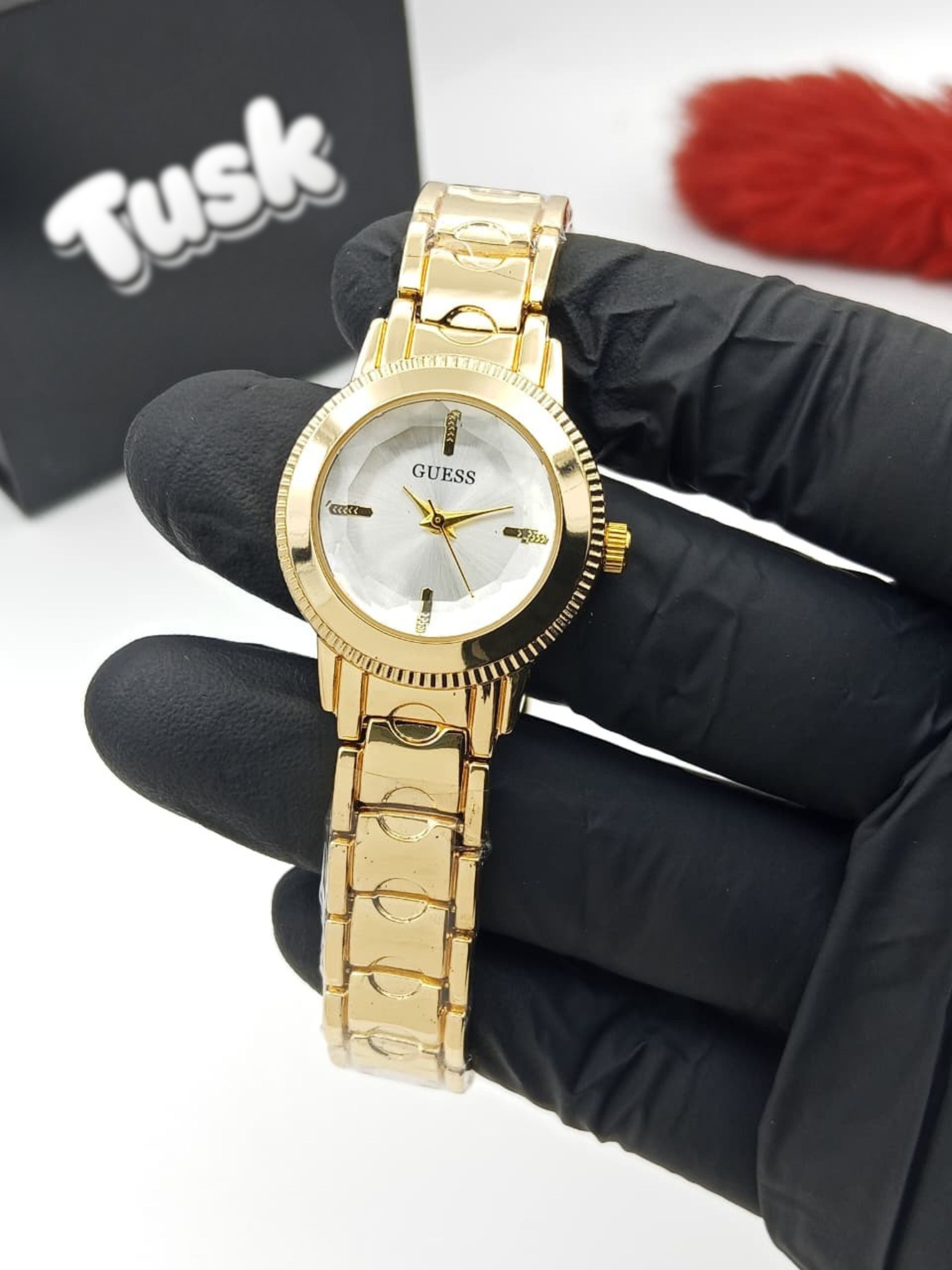 Guess Elegant Round Dial Ladies Wristwatch - Golden White