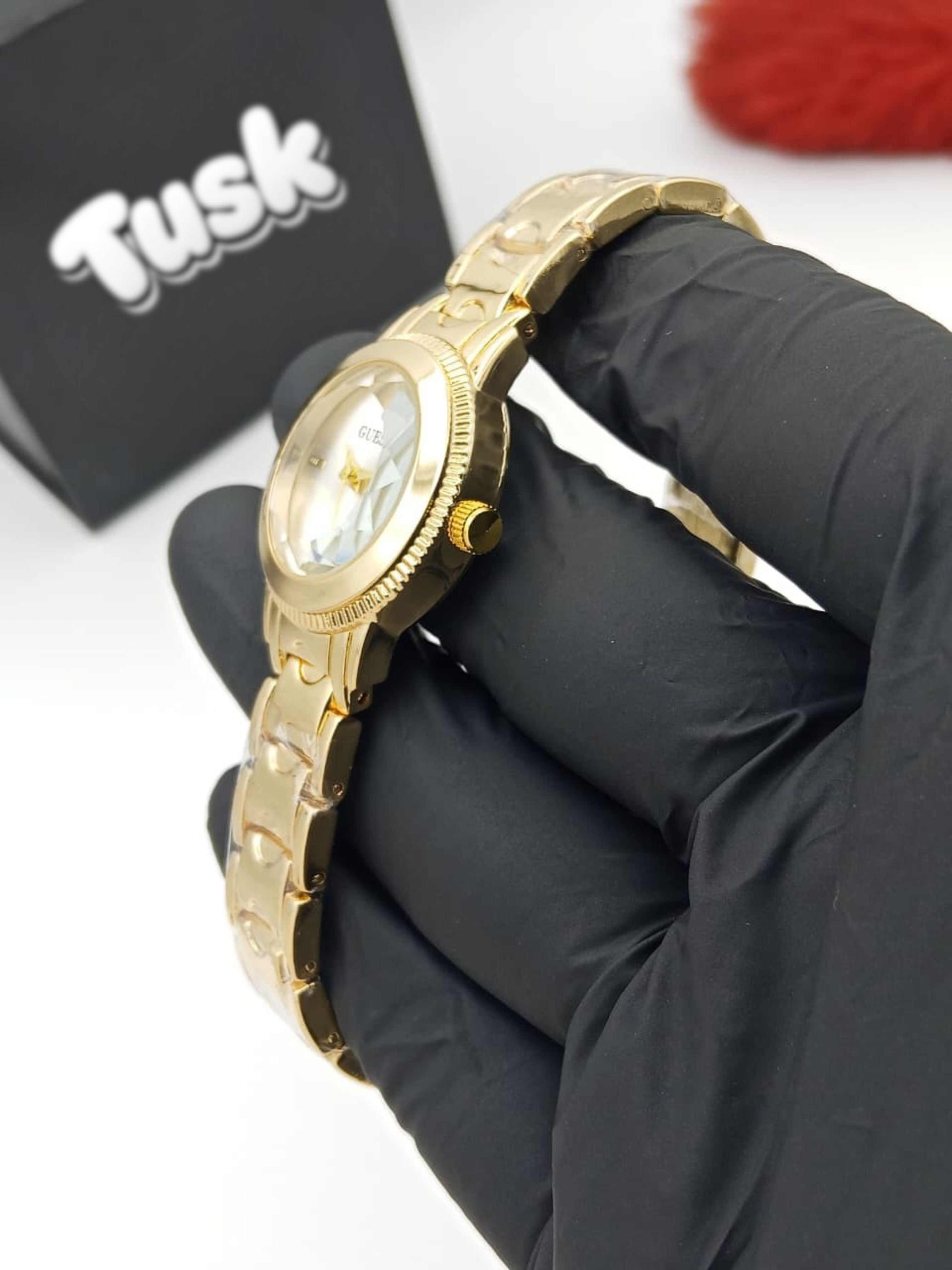 Guess Elegant Round Dial Ladies Wristwatch - Golden White